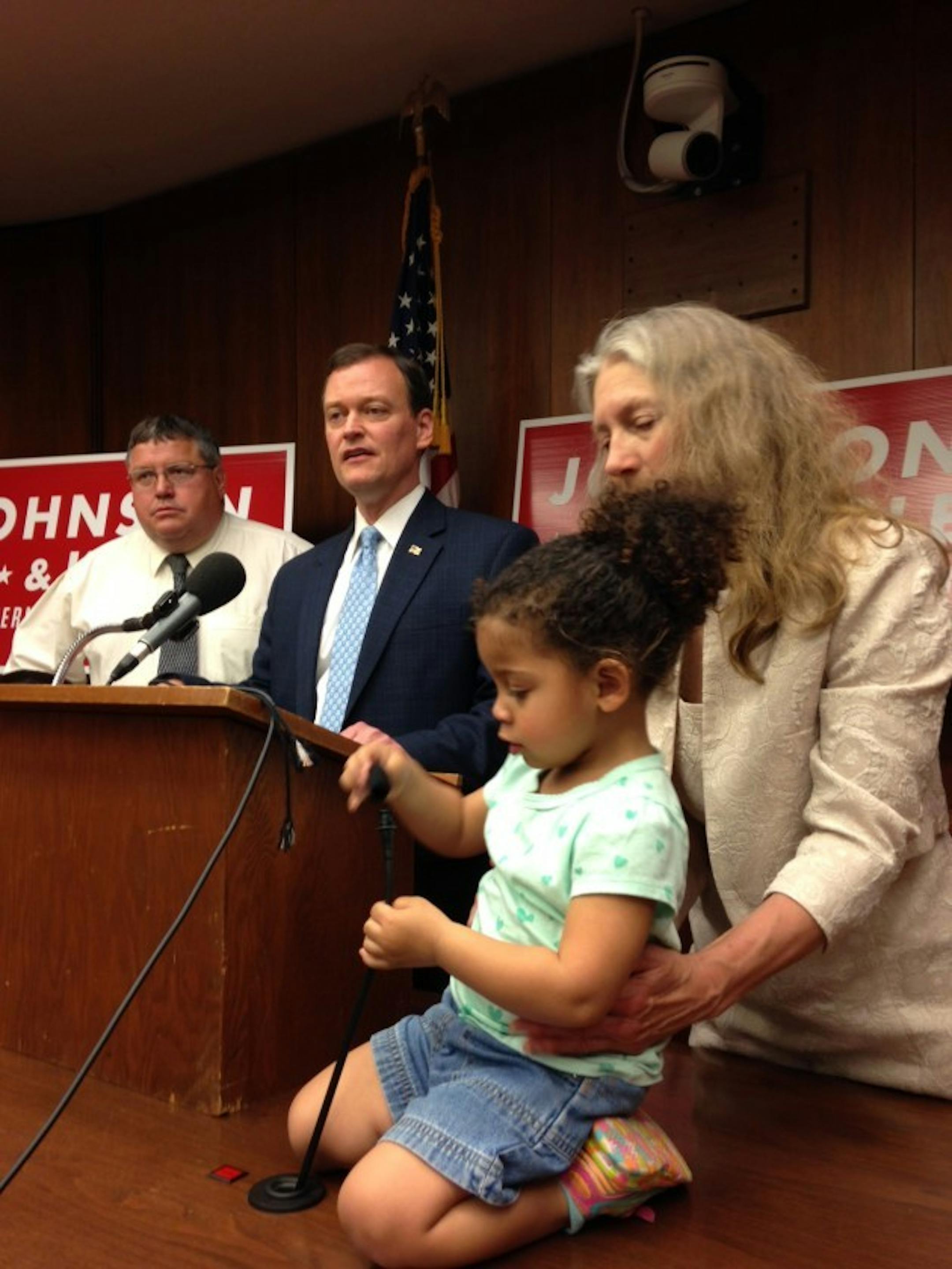 Former Rep. Bill Kuisle, left, and Jeff Johnson, at podium