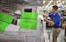 Matt Phillips pulled an item for a customer who ordered the item on line and picked it up at the service desk of the Apple Valley Best Buy Store.