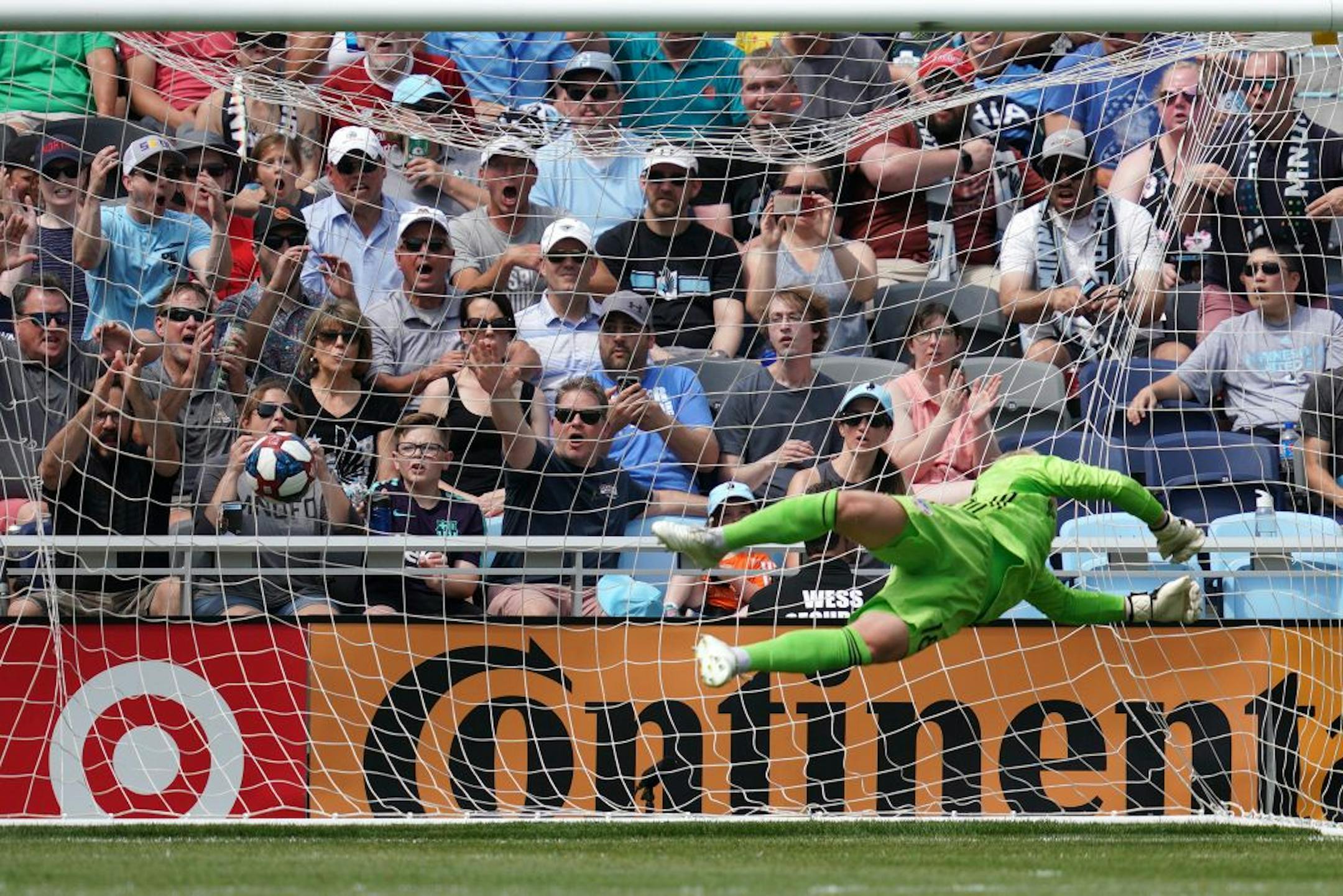 FC Cincinnati goalkeeper Spencer Richey (18) was unable to stop a shot by Minnesota United midfielder Hassani Dotson (31) in the first half.