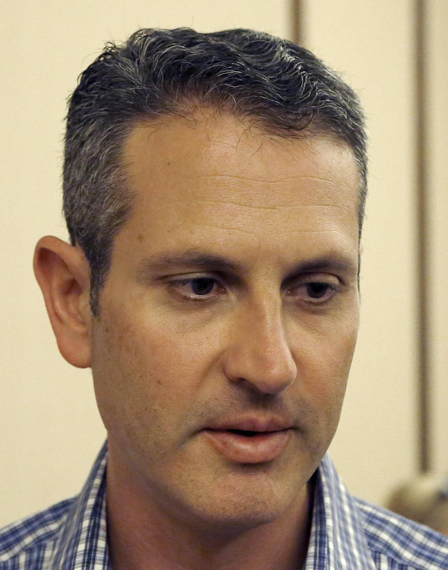 Minnesota Twins general manager Thad Levine listens to a question from a reporter during baseball's annual general managers meeting Wednesday, Nov. 9, 2016, in Scottsdale, Ariz. (AP Photo/Ross D. Franklin)