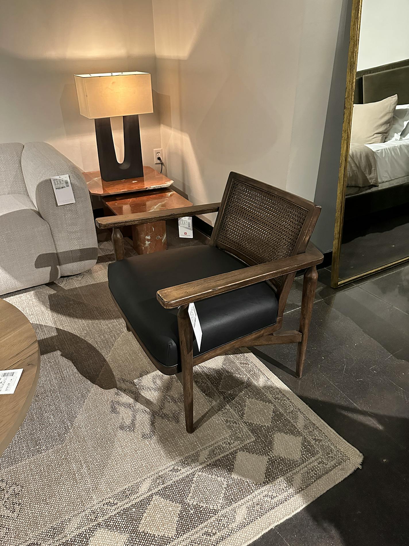 A modern take on a midcentury modern-style chair is displayed on a retail floor. (Handout/TNS)