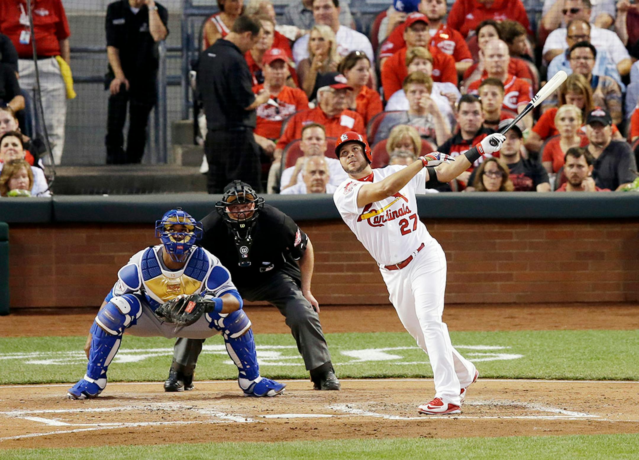 National League's Jhonny Peralta, of the St. Louis Cardinals, hits an RBI single during the second inning of the MLB All-Star baseball game, Tuesday, July 14, 2015, in Cincinnati.
