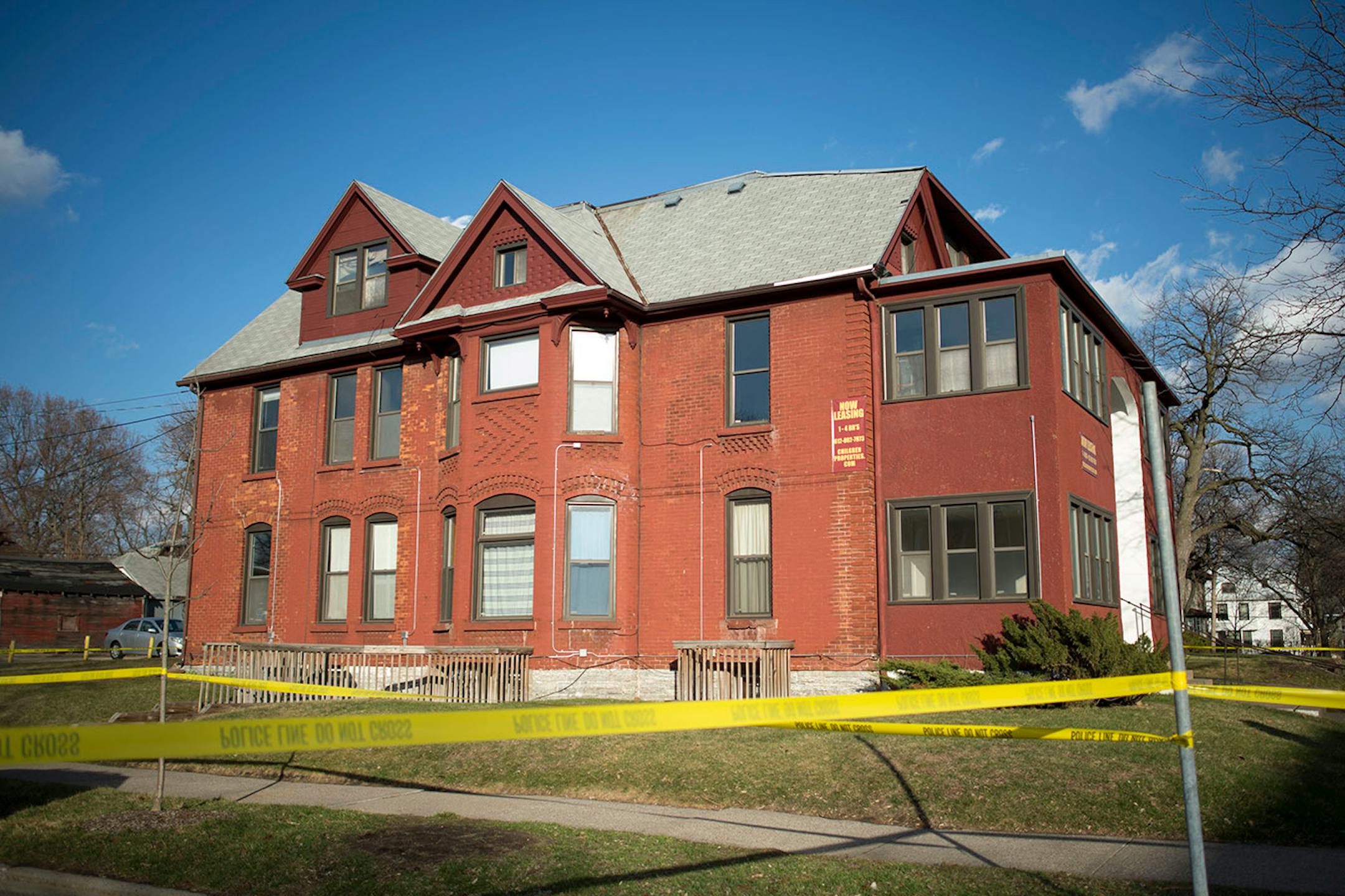 Police tape cordons off the apartment building at 503 6th Street Southeast during a hazardous material scare on Friday afternoon.
