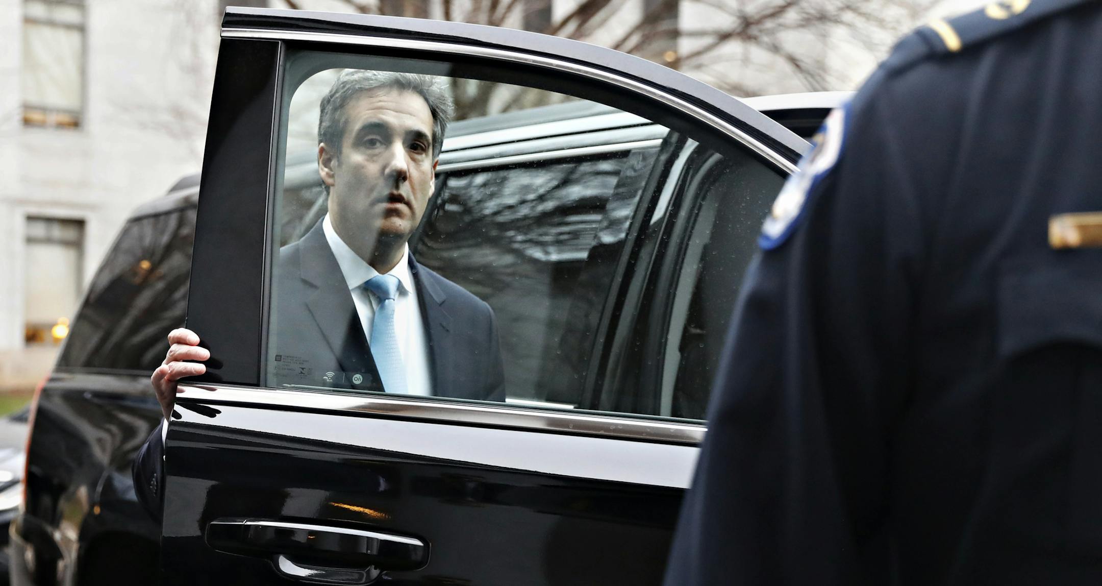 Michael Cohen, President Donald Trump's former personal lawyer, leaves Capitol Hill after testifying before the House Oversight and Reform Committee in Washington, Wednesday, Feb. 27, 2019. (AP Photo/Jacquelyn Martin)