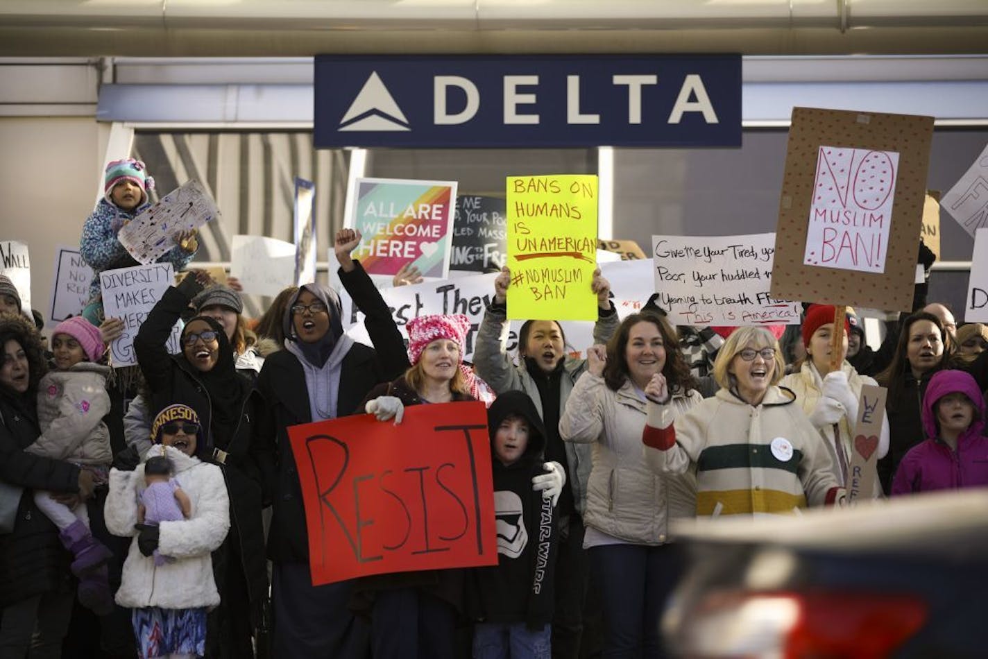 Demonstrators protest President Trump's travel ban on refugees and citizens of seven Muslim-majority nations at Minneapolis-Saint Paul International Airport on Jan. 29.