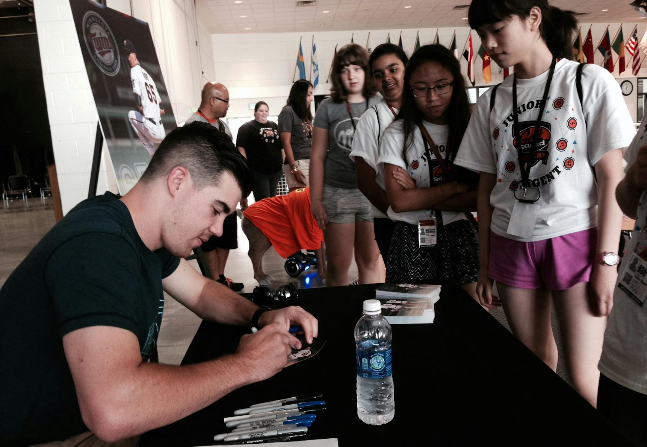 Twins pitcher Trevor May signs autographs for participants in the Best Buy Geek Squad technology camp Tuesday in St. Paul.