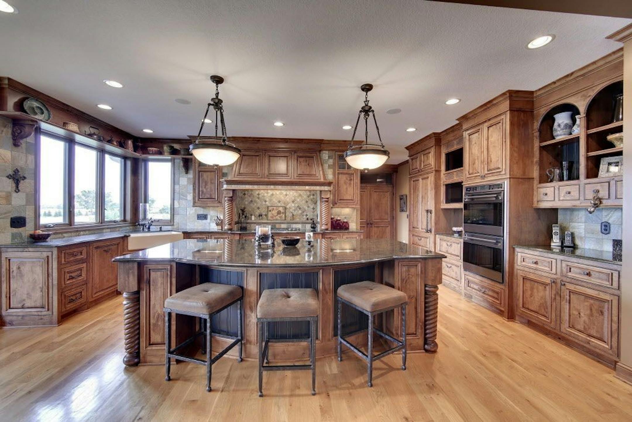 The kitchen features knotty alder cabinets and granite countertops.