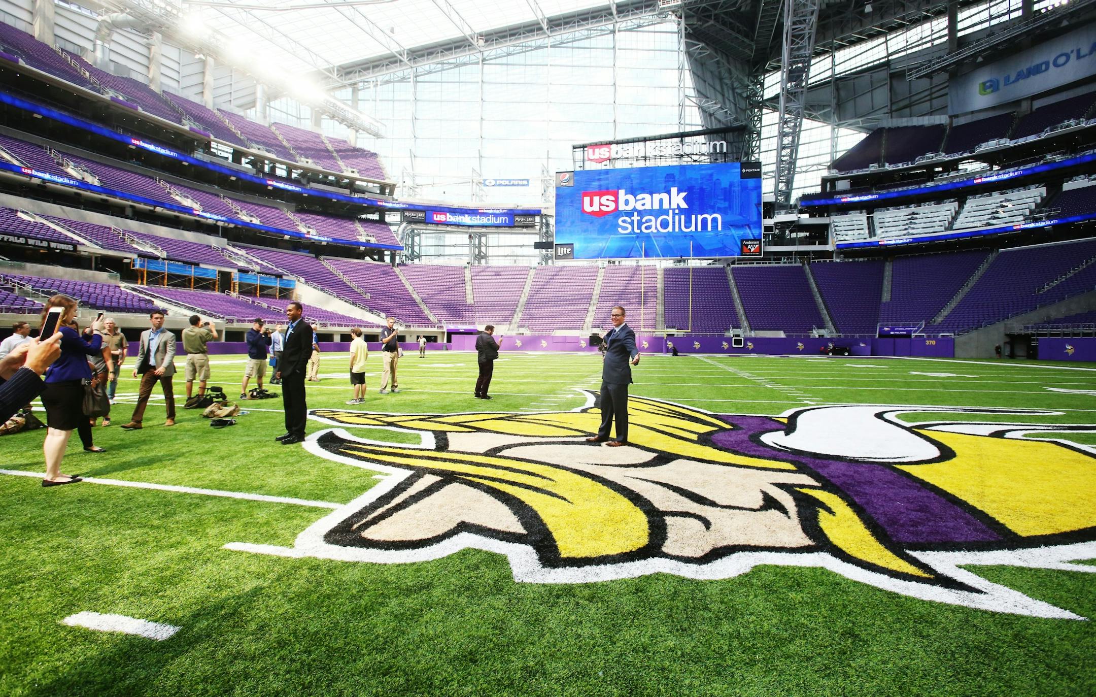 The Viking logo and midfield became selfie central during a media tour Tuesday, July 19, 2016, at U.S. Bank Stadium in Minneapolis, MN.