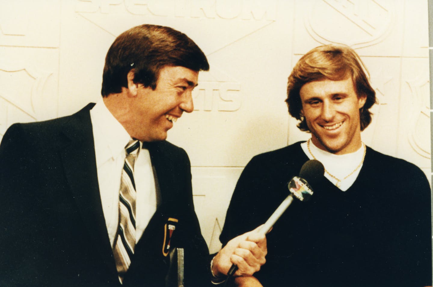 Dick Bremer from the early 1980s talking to tennis star Bjorn Borg. Photo courtesy of Dick Bremer