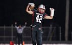 Centennial fullback Lance Liu celebrates his two point conversion in the second quarter during 6A section football action at Centennial High School.