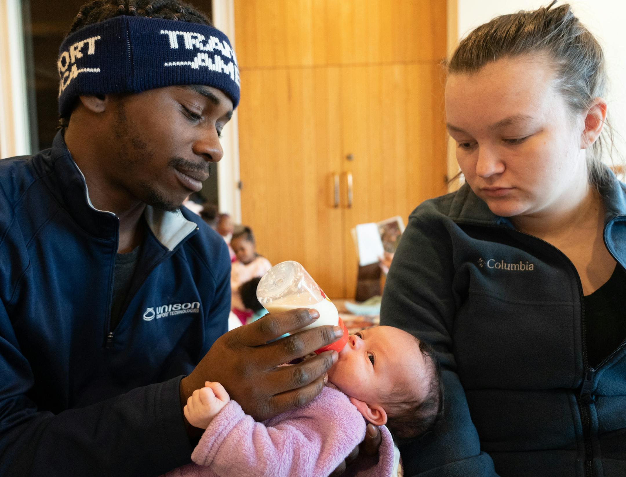 Jamal Jones cradled his five-week-old daughter Chanel in a common room at Bethlehem Baptist Church. ] MARK VANCLEAVE &#xa5; Jamal Jones and Alliyah Ross (both 20) and their five-week-old daughter Chanel have been staying at Bethlehem Baptist Church with about 100 other former Francis Drake Hotel residents since the Christmas Day fire. Photographed Friday, Dec. 27, 2019 in Minneapolis.
