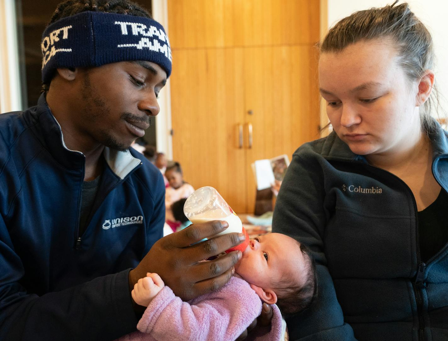 Jamal Jones cradled his five-week-old daughter Chanel in a common room at Bethlehem Baptist Church. ] MARK VANCLEAVE &#xa5; Jamal Jones and Alliyah Ross (both 20) and their five-week-old daughter Chanel have been staying at Bethlehem Baptist Church with about 100 other former Francis Drake Hotel residents since the Christmas Day fire. Photographed Friday, Dec. 27, 2019 in Minneapolis.