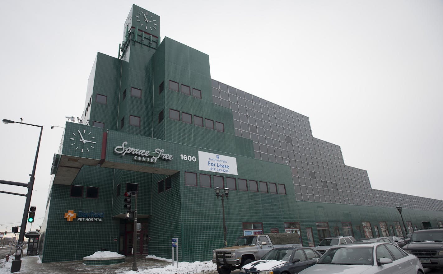 The Spruce Tree Centre in St. Paul. ] (Aaron Lavinsky | StarTribune) $1 million renovation about to get underway at the Spruce Tree Center, the odd-duck, green-clad office/retail building at Snelling & University in St. Paul. Built in 1987, the Spruce Tree has had its ups-and-downs over the years, but has always been extremely recognizable with its green tile exterior -- which inspires a kind of strong love/hate reaction. The Spruce Tree Center was photographed Tuesday, Jan. 6, 2014.