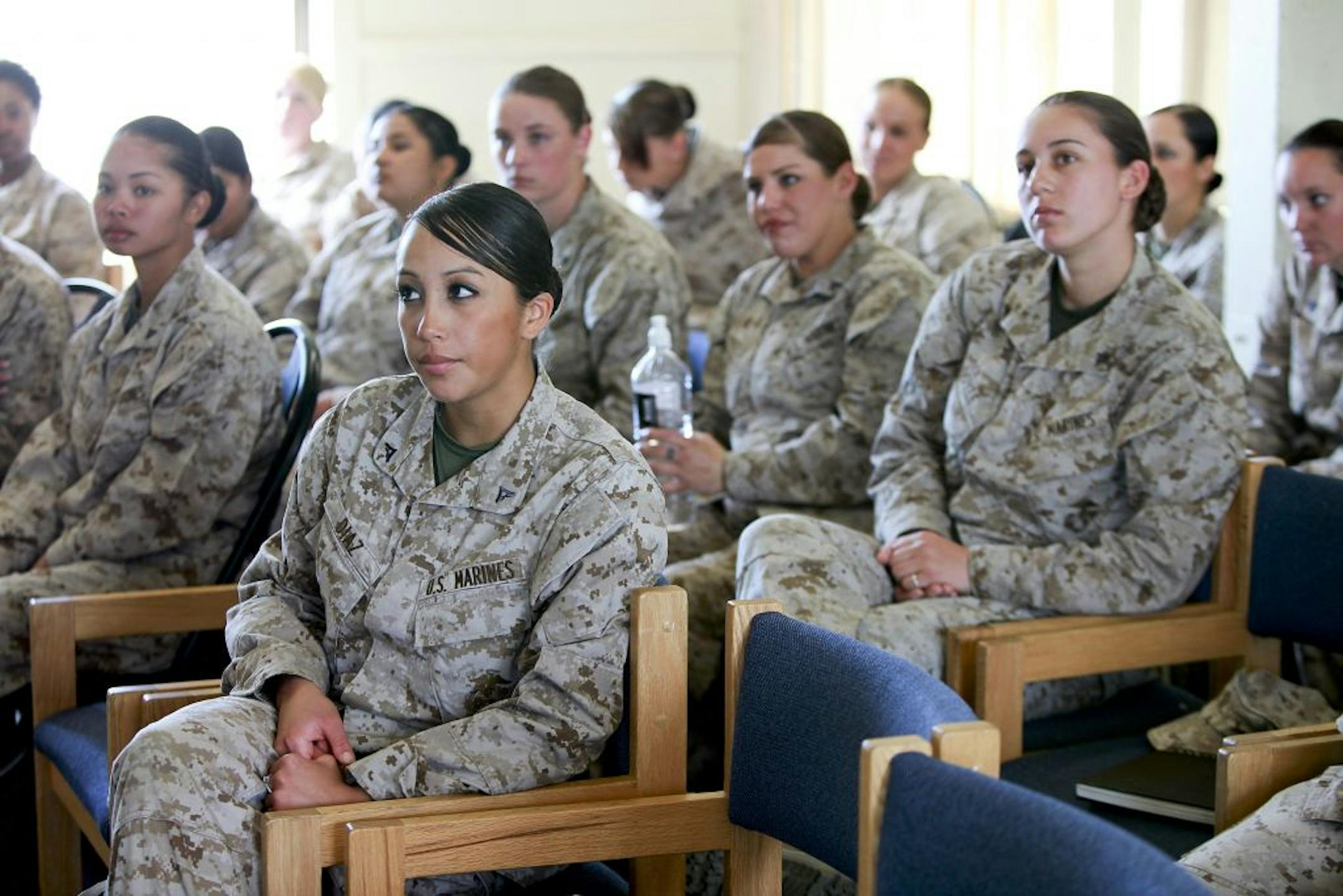 FILE -- Female Marines at a "cultural awareness" exercise at Camp Pendleton, Calif., Feb. 24, 2010. The announcement in January, 2013, ending the ban on women in combat only accelerated a sweeping re-examination of fitness standards in the American military.