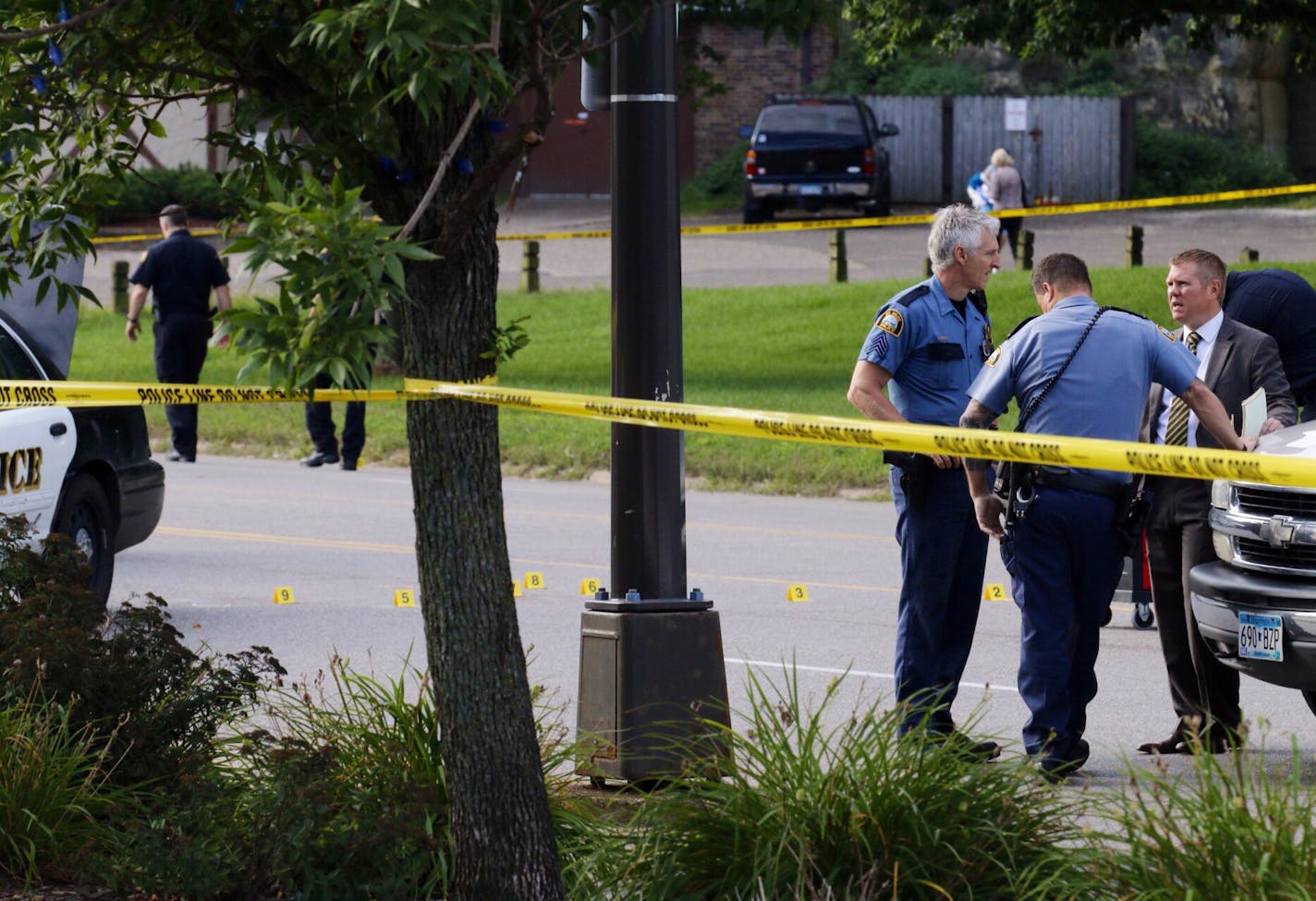 This was the scene on Wabasha Ave. near Plato Blvd. after a. Early morning shooting involving police and a man vandalizing in the area. Bullet casings are marked on the road. ] BRIAN PETERSON/STAR TRIBUNE