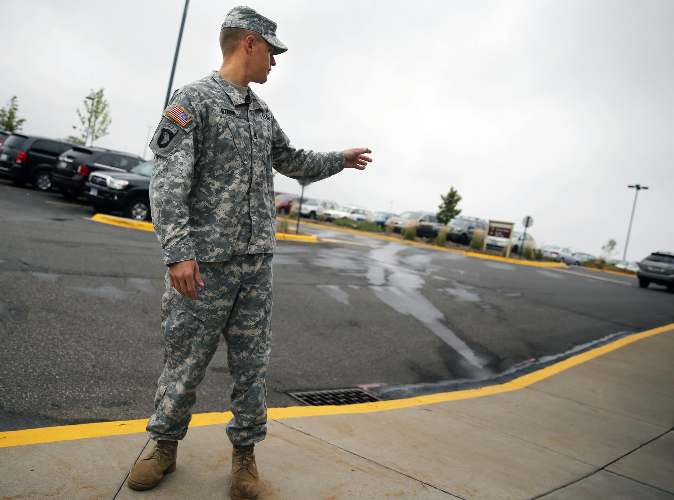 At the army recruiting office in Roseville, 29-year-old Staff Sgt. Michael Stroud, of Brooklyn Park, was not seriously injured and did not require hospitalization while Travis Torgerson was dragged under a car and nearly killed .]richard tsong-taatarii/rtsong-taataarii@startribune.com