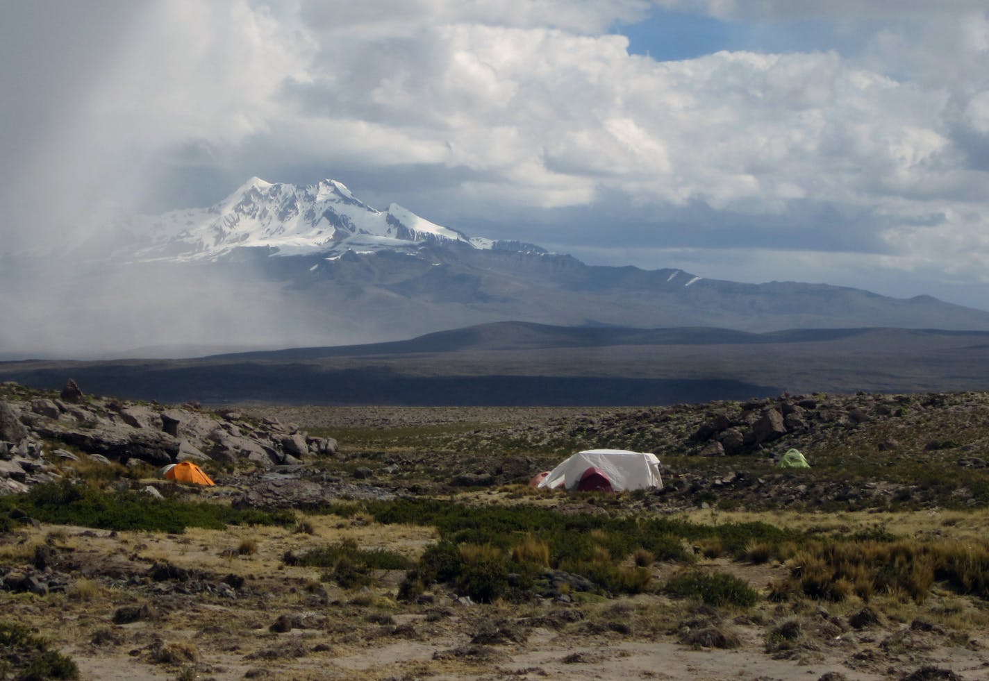 This undated image provided by journal Science shows a campsite in Pucuncho Basin. Stone tools and other artifacts have revealed the presence of hunter-gatherers at about 14,700 feet above sea level, between 12,000 and 12,500 years ago in the Peruvian Andes. (AP Photo/Science, Matthew Koehler)