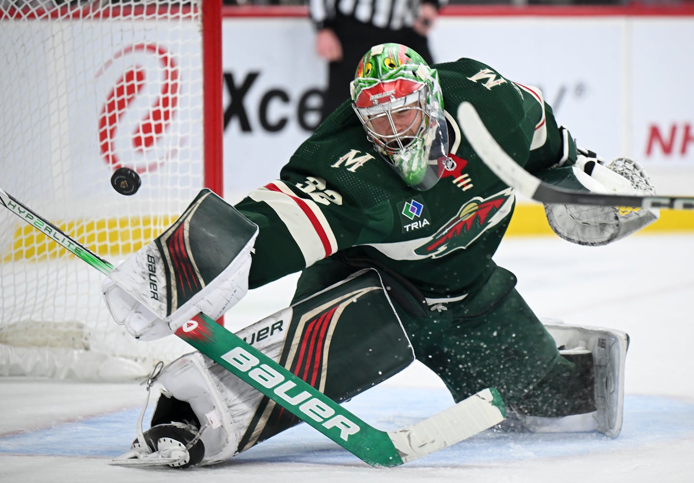 Minnesota Wild goaltender Filip Gustavsson (32) makes a save against the Calgary Flames during the second period Thursday, Dec. 14, 2023 at Xcel Energy Center in St. Paul, Minn.. ] AARON LAVINSKY • aaron.lavinsky@startribune.com