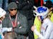 Tiger Woods, left, watches United States' Lindsey Vonn, right, during the women�s giant slalom competition at the alpine skiing world championships 