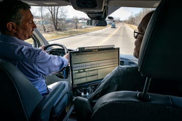 MNDOT data collection supervisor Mark Resemius and transportation specialist Dave Larson headed out with the road and pavement survey vehicle.