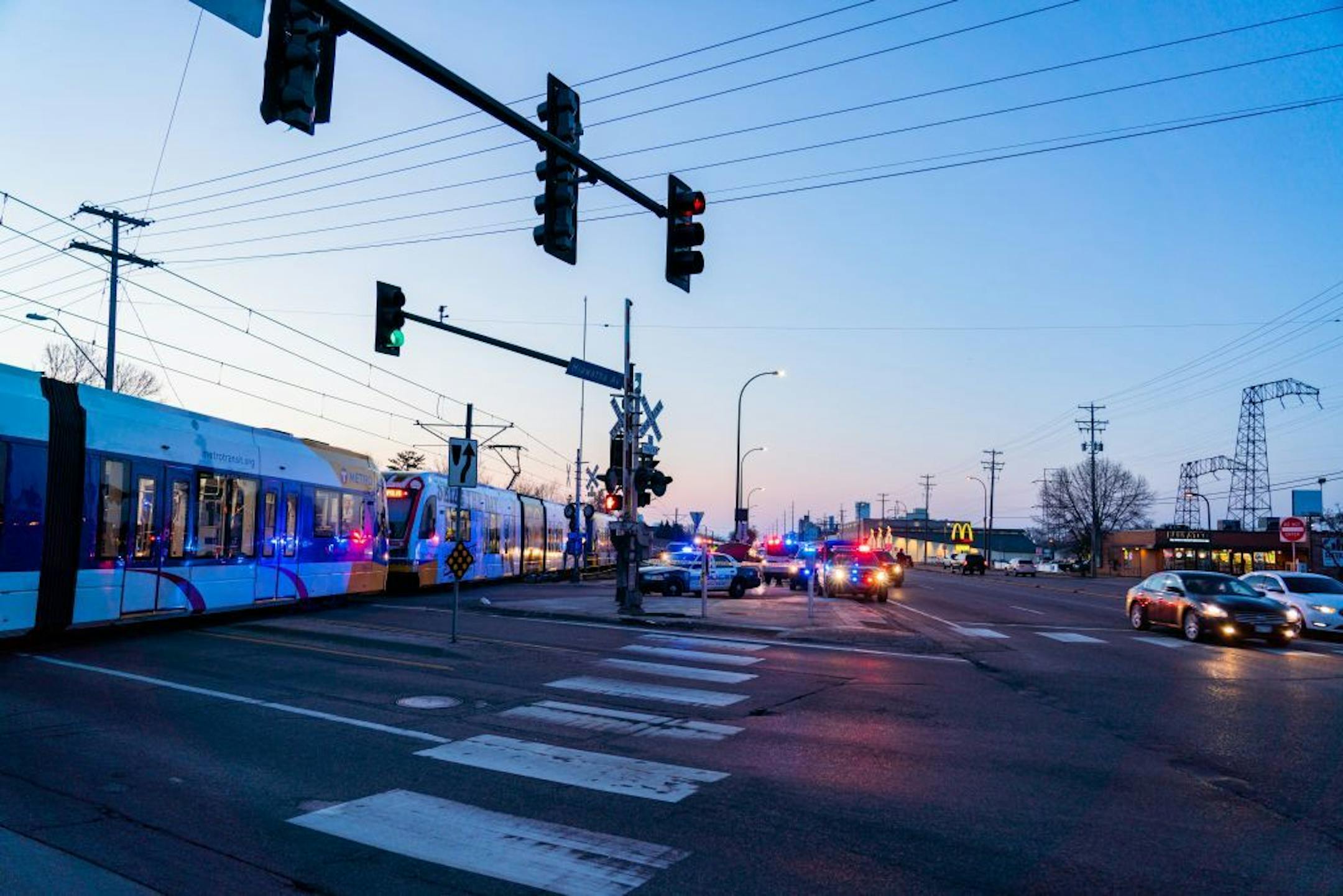 The train and bicycle remained in place as police and Hennepin County Medical Examiner staff worked the scene.