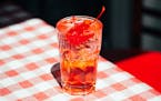 The Dirty Shirley, a grown-up version of the classic Shirley Temple, made of vodka, grenadine, lemon lime soda and maraschino cherries, at Fanelli's C
