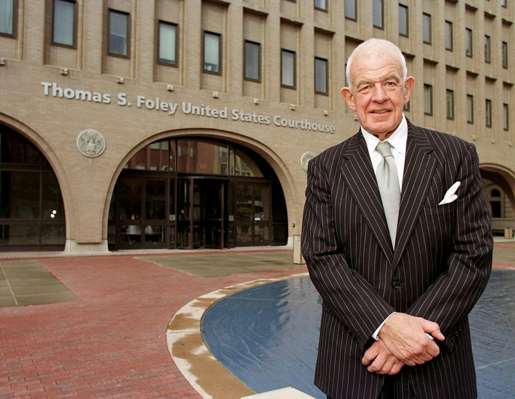 FILE - In this April 6, 2001 file photo, former House Speaker Tom Foley stands outside the federal courthouse in Spokane, Wash. Foley has died at the age of 84.
