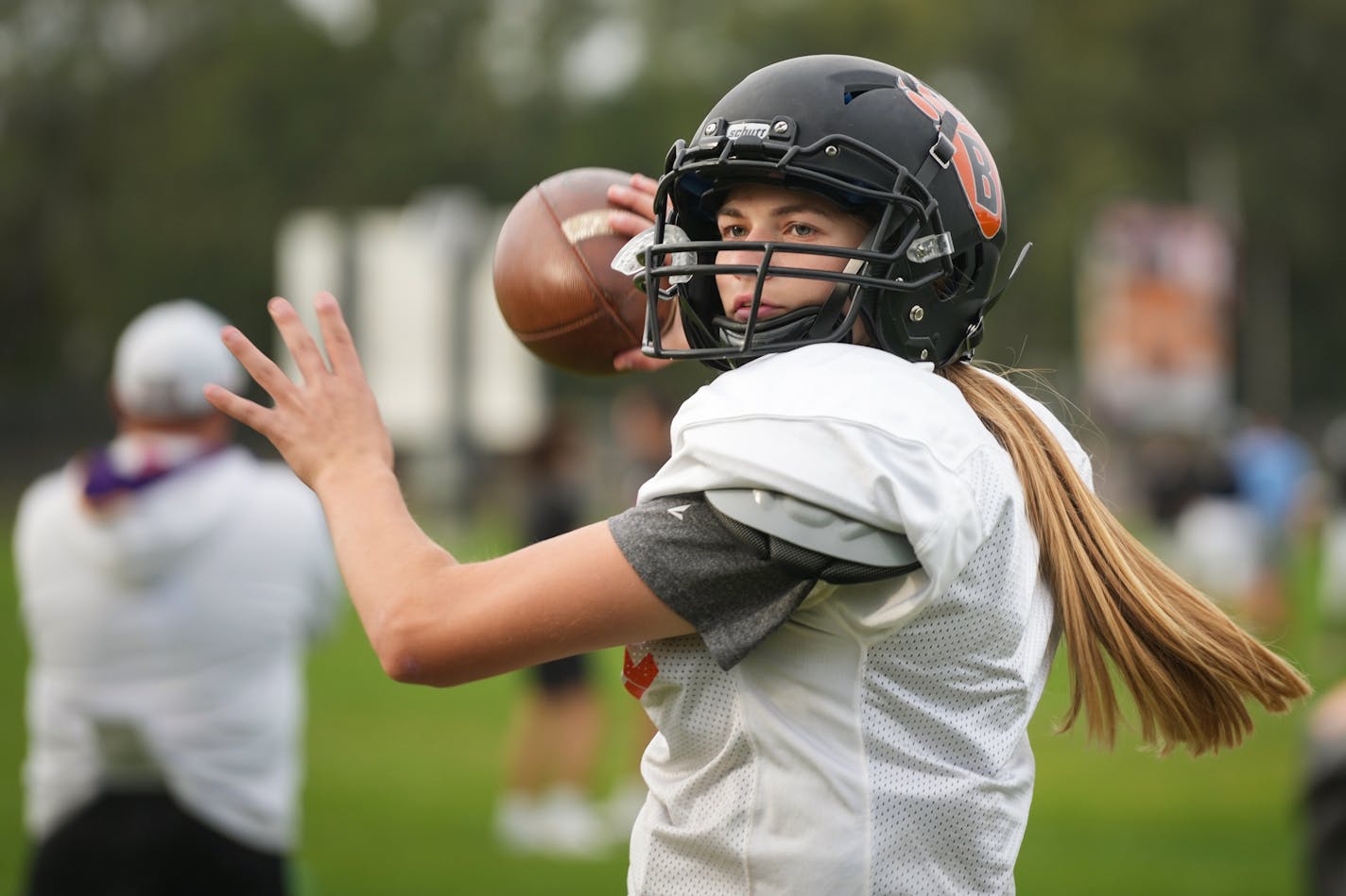 Junior quarterback Heidi Barber has taken varsity snaps for White Bear Lake this season.practices ith her team, Tuesday, Oct. 4, 2022 in White Bear Lake, Minn. Girls are playing football — and not just as kickers. ] SHARI L. GROSS / shari.gross@startribune.com