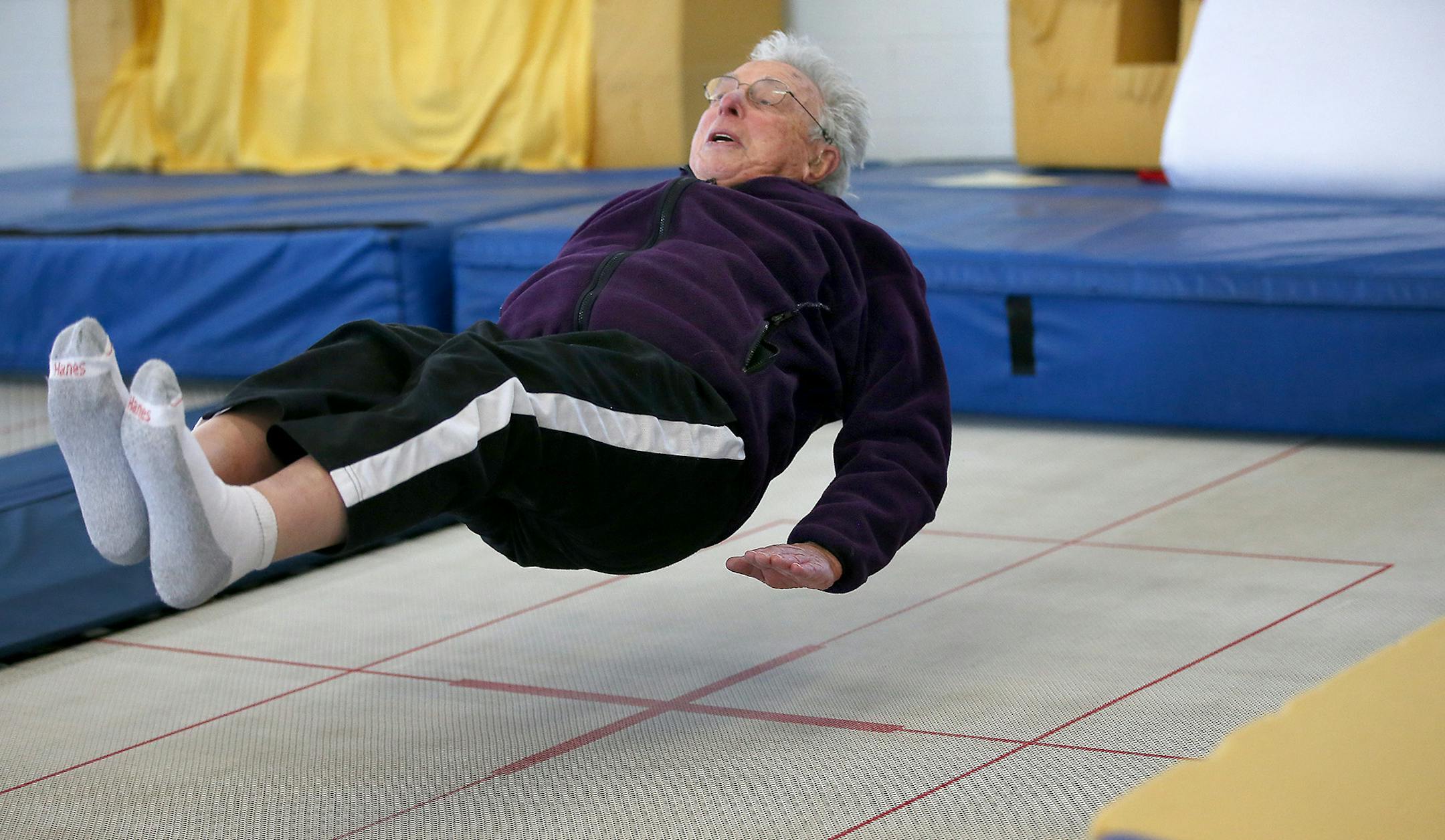 Elliott Royce took trampoline lessons at Minnesota Twisters, Tuesday, February 25, 2015 in Edina, MN. Royce estimates that he has fallen down at least 14,000 times. He's not clumsy; he's doing it on purpose. He teaches people -- primarily seniors -- how to fall safely if they are undone by slippery sidewalks. ] (ELIZABETH FLORES/STAR TRIBUNE) ELIZABETH FLORES • eflores@startribune.com
