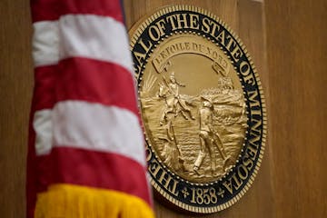 The Minnesota seal above the bench in a Hennepin County courtroom.