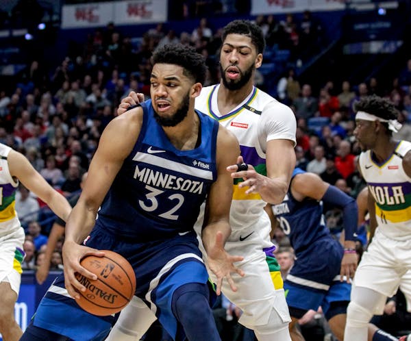 "AD is a better athlete. Karl is a better shooter," Timberwolves assistant coach Kevin Hanson said of Anthony Davis, right, and Karl-Anthony Towns.