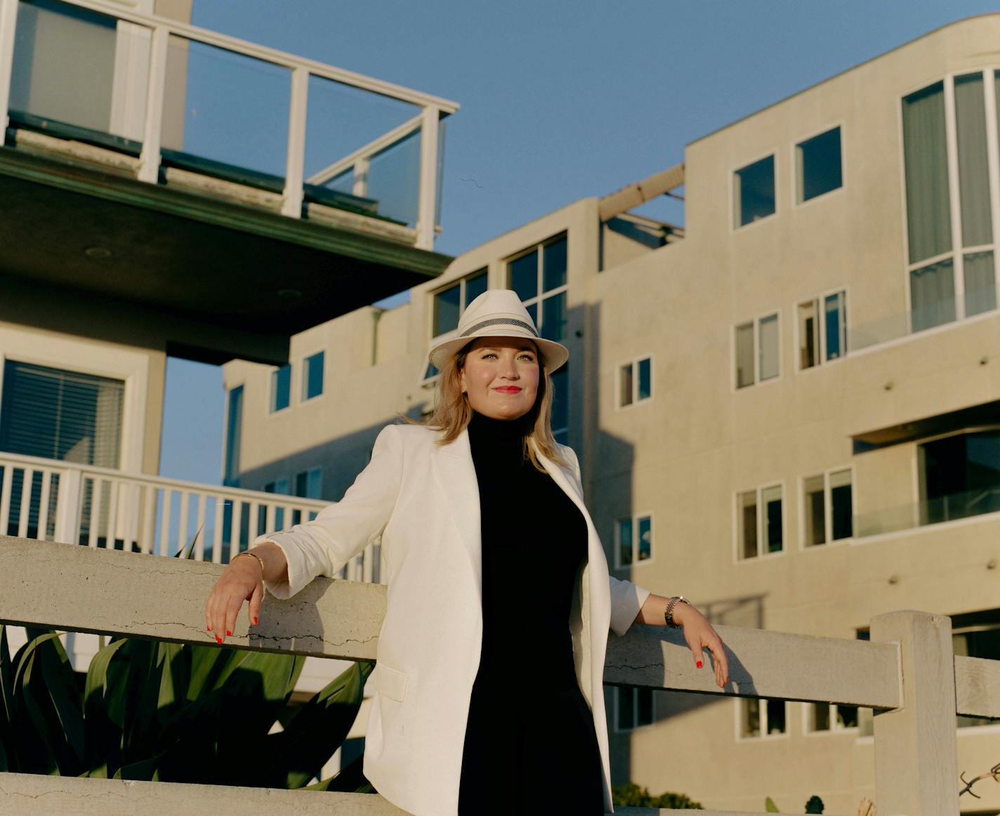 Caroline Cassini stands for a portrait in Marina Del Rey, Calif. on Aug. 8, 2021. Cassini, now 29, may have startled some neighbors in West Orange, N.J., when she announced that, rather than applying to an East Coast liberal arts college, she would follow a path charted by her family and pursue a curriculum in automotive restoration at the Academy of Art University in San Francisco. (Tracy Nguyen/The New York Times)