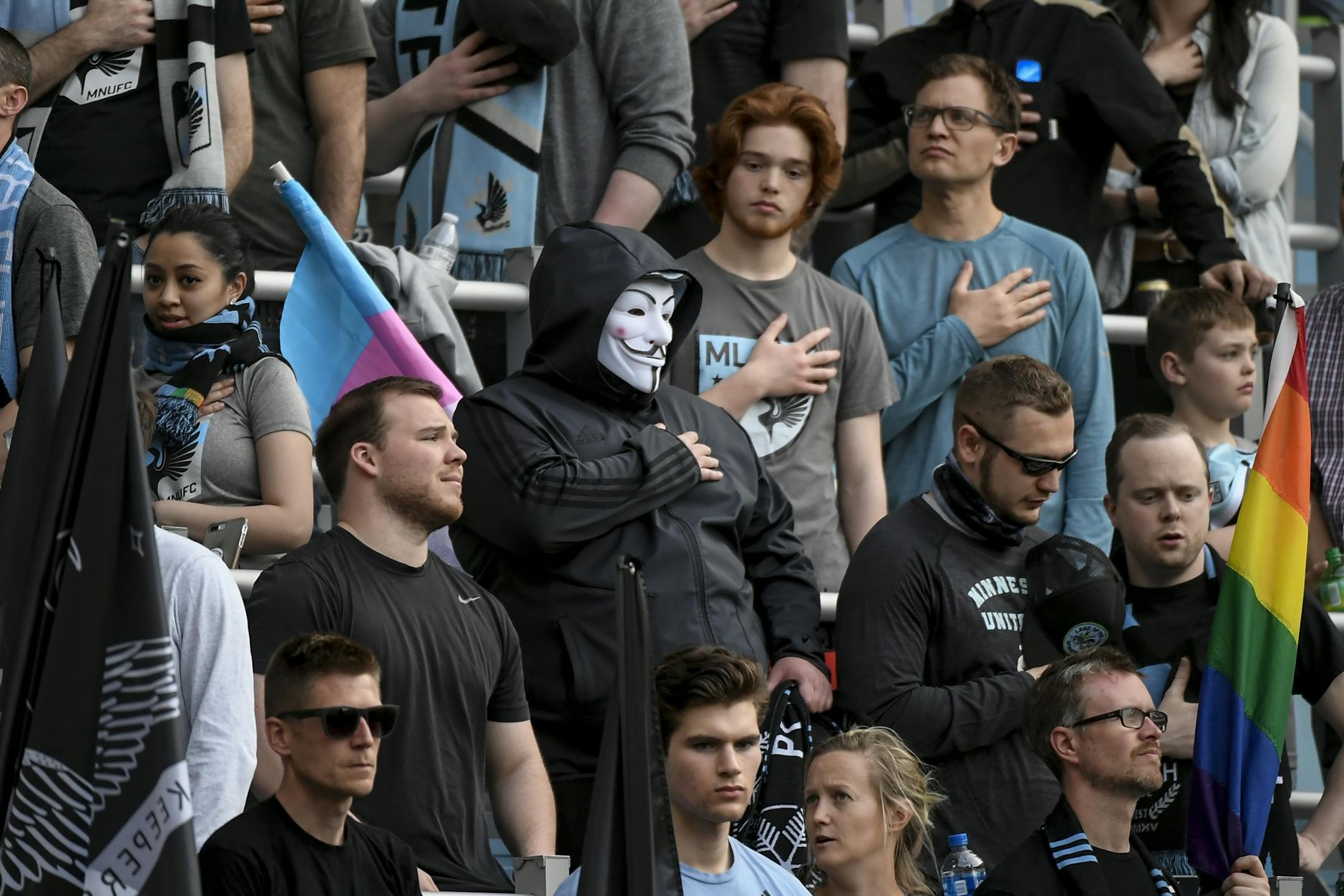 A fan, wearing a Guy Fauxe mask, held his hand over his heart during the singing of the National Anthem Wednesday night before the Minnesota UnitedÕs game against the Los Angeles Galaxy.