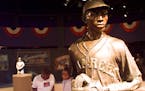 ** ADVANCE FOR WEKEND OF DEC. 6-7 -- FILE ** Visitors test their Negro Leagues Baseball knowledge at one of the many state-of-the-art interactive comp