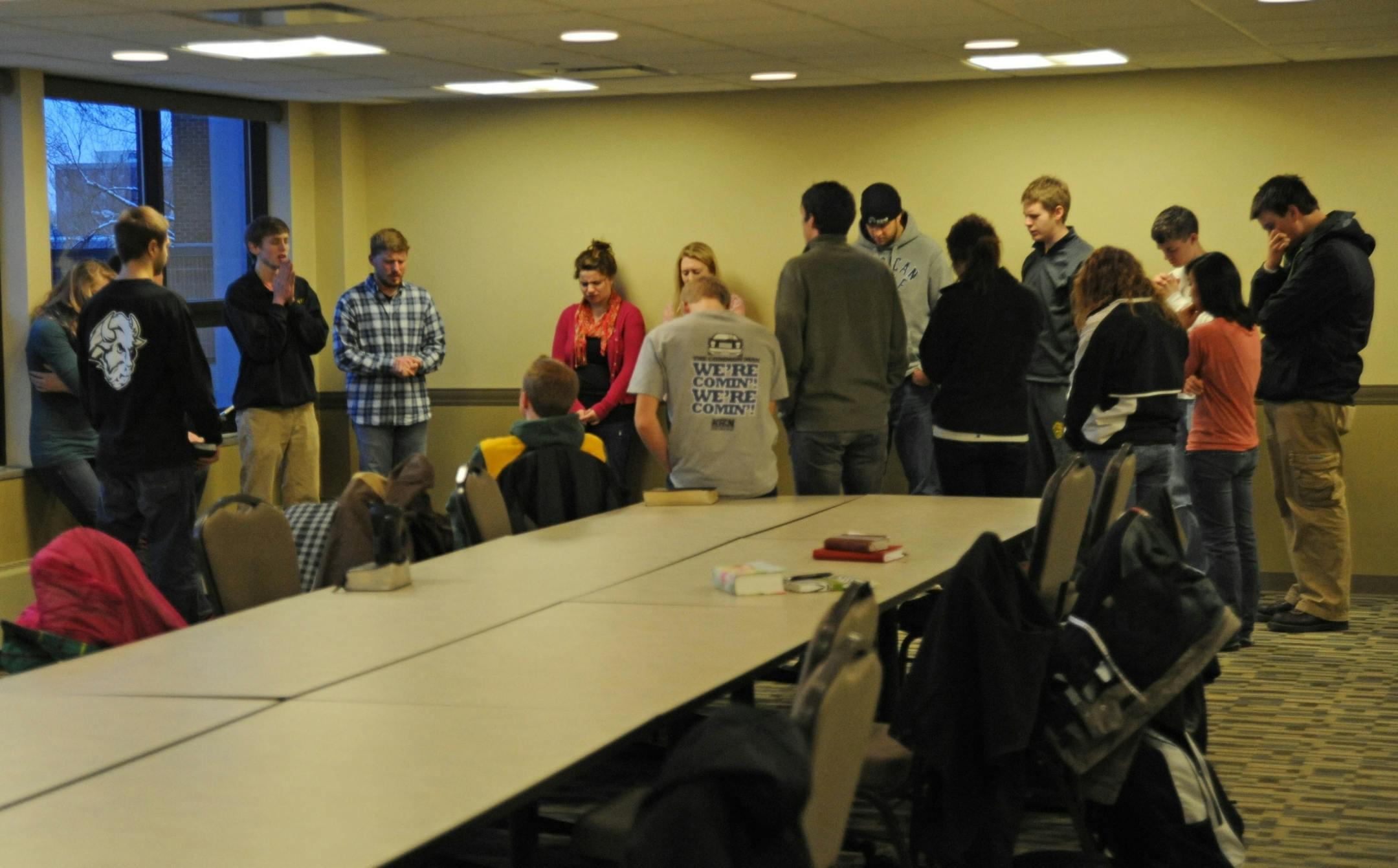 A group of students showed up for a prayer session Wednesday morning at the North Dakota State University student union to pray for the families of four freshmen killed in a car accident Monday.