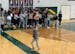 Fans celebrated the game-winning shot by Patrick Rowe of Chisago Lakes.