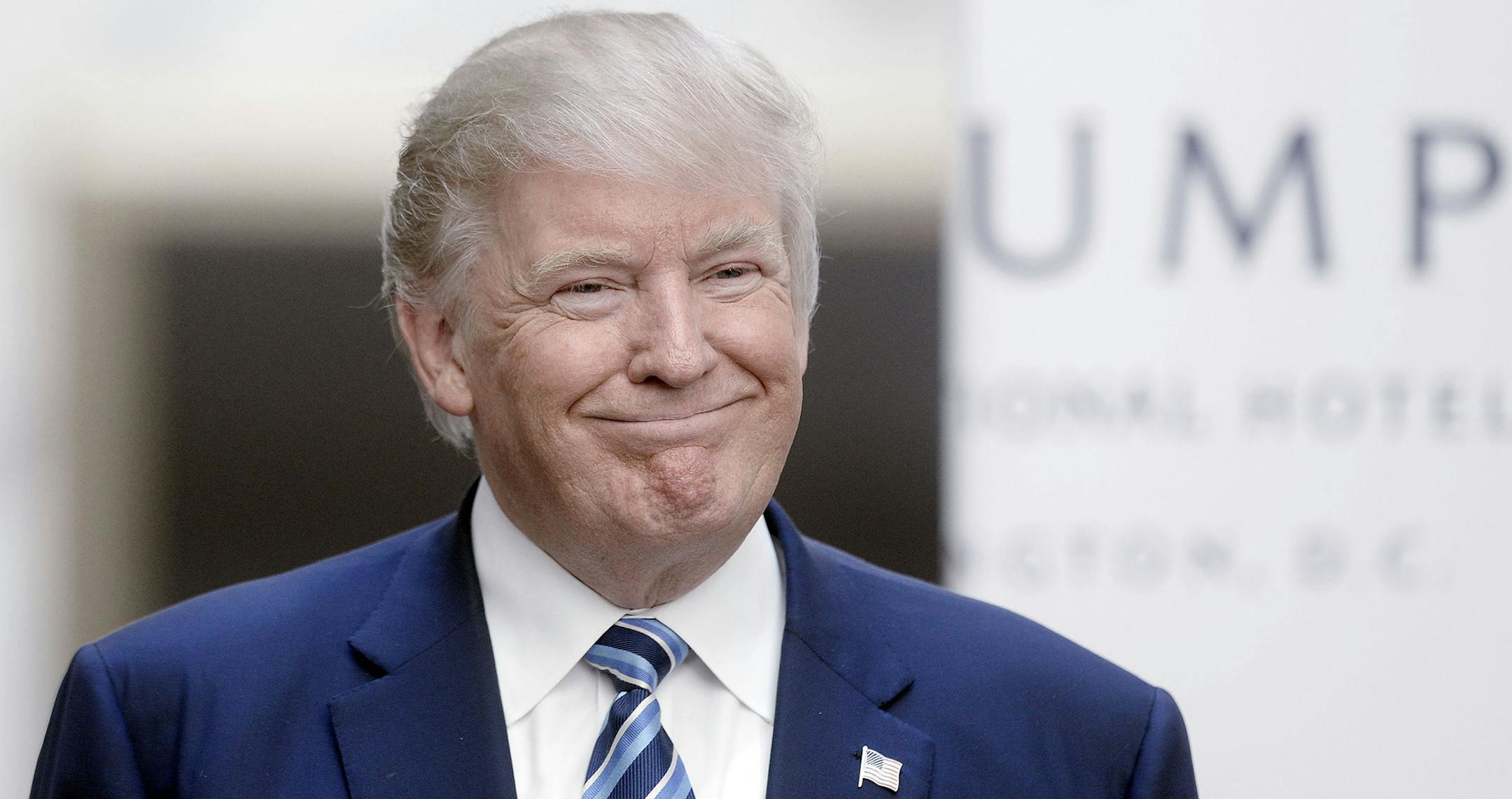 Republican presidential nominee Donald Trump looks on at the grand opening of the Trump International Hotel on October 26, 2016 in Washington, DC. (Olivier Douliery/Abaca Press/TNS) ORG XMIT: 1192246