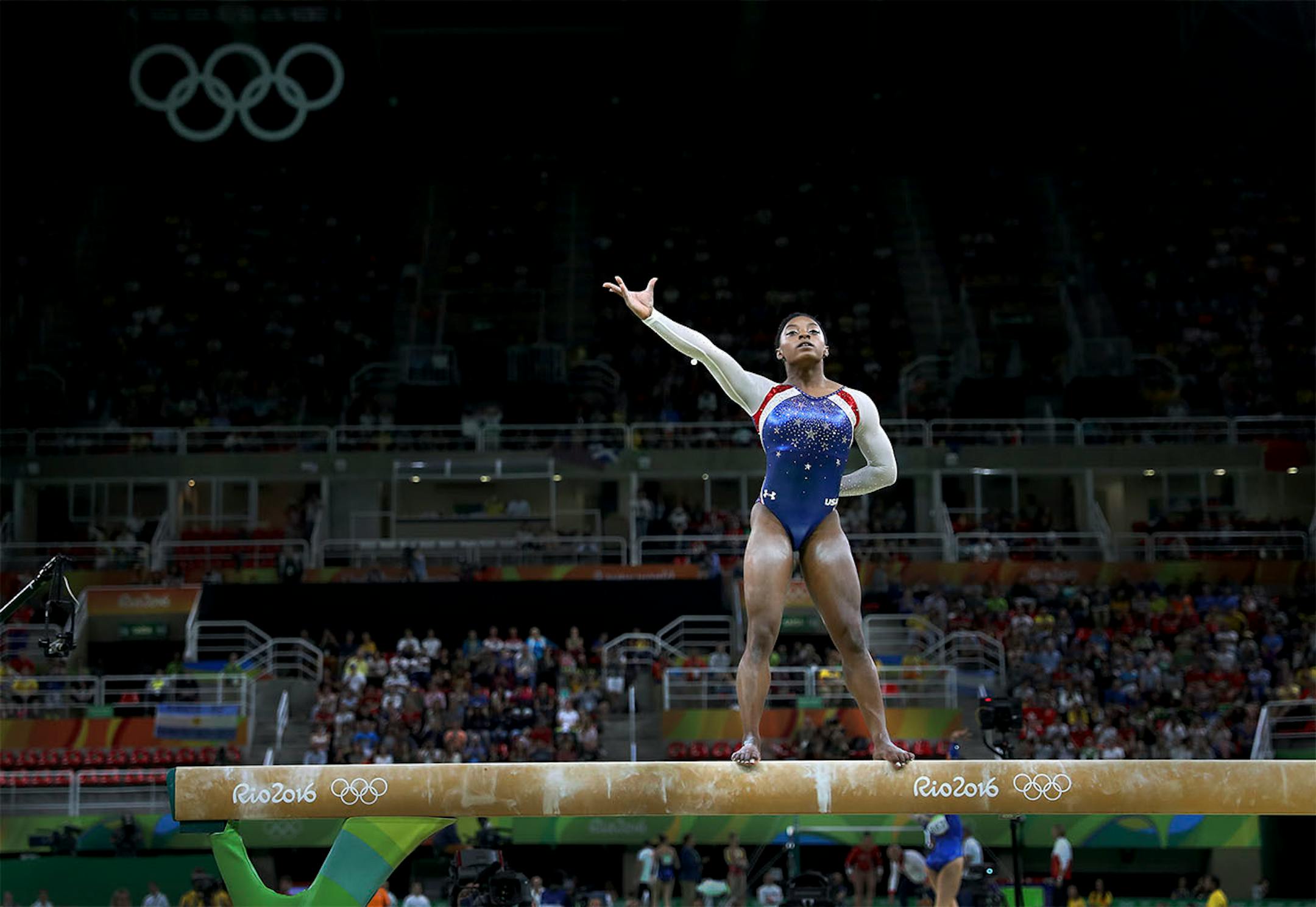 Simone Biles won the all around title in women's gymnastics and added three more gold and one bronze to her total at the Rio games. Here, Biles competes on the Beam.