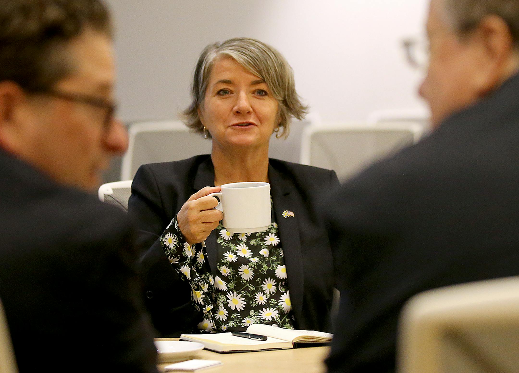 The Swedish Ambassador to the U.S. was in Minnesota and met with Jewish community leaders to discuss rising antisemitism in Europe on the eve of Yom Kippur. Karin Olofsdotter is the first woman to hold the post. During her first months on the job, she's been meeting with Jewish groups across the country to talk about antisemitism in Europe as well as rising nationalist feelings here in America. Here, Olofsdotter, rmiddle, enjoyed a cup of coffee while listening to Steve Hunegs, executive directo
