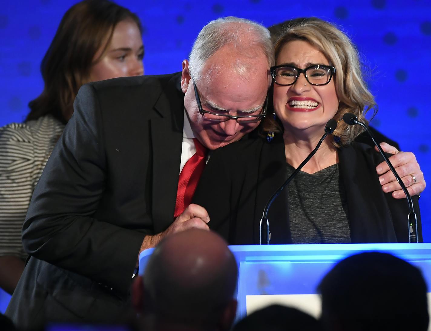 Governor-elect Tim Walz embraced running mate, Lt. Governor-elect Peggy Flanagan, as they took the stage for their acceptance speech Tuesday night at the DFL headquarters election party.