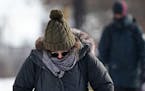 Carolyn Christofferson, a freshman at the University of Minnesota studying biomedical engineering, walked bundled up against the cold Tuesday.