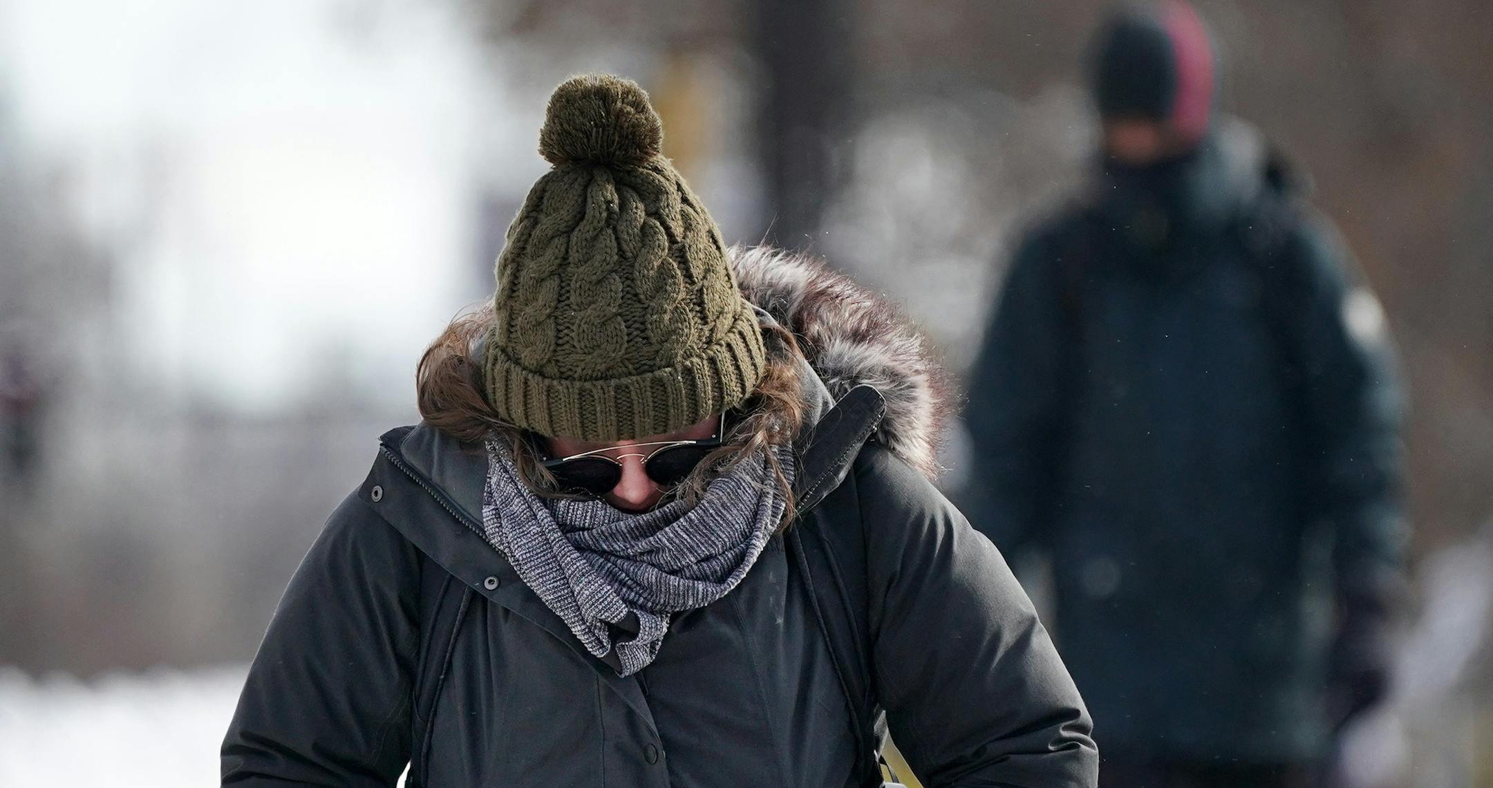 Carolyn Christofferson, a freshman at the University of Minnesota studying biomedical engineering, walked bundled up against the cold Tuesday.