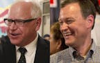 Tim Walz, left, and Jeff Johnson, right, debated Friday at the Minnesota State Fair.