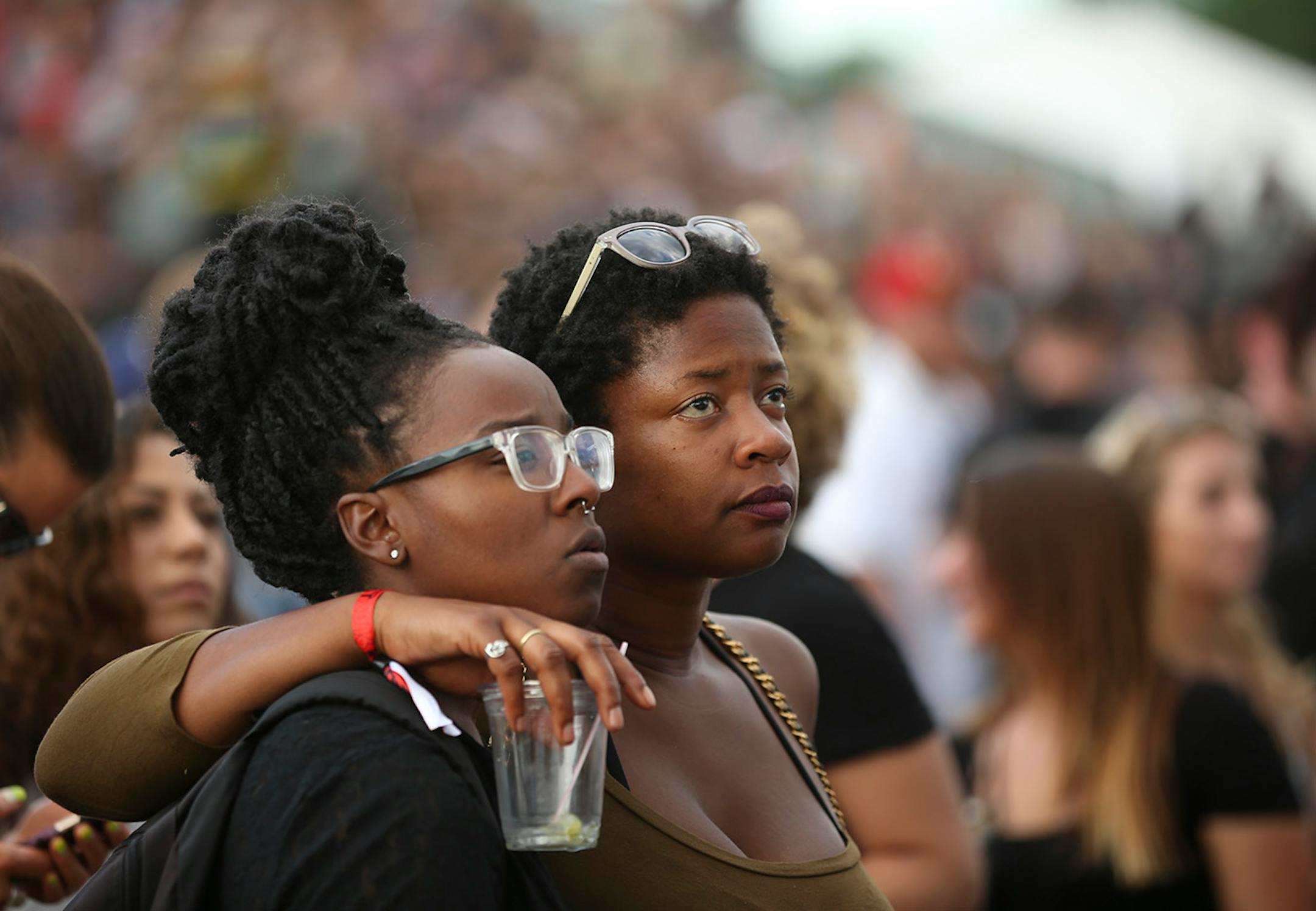Adriana Foreman, left, and Junauda Petrus lisfened to The Roots on the Main Stage Sunday evening at Soundset 2016. ] JEFF WHEELER ï jeff.wheeler@startribune.com The ninth annual Soundset hip-hop festival took place in its new location at the Minnesota State Fairgrounds Sunday, May 29, 2016 in Falcon Heights.