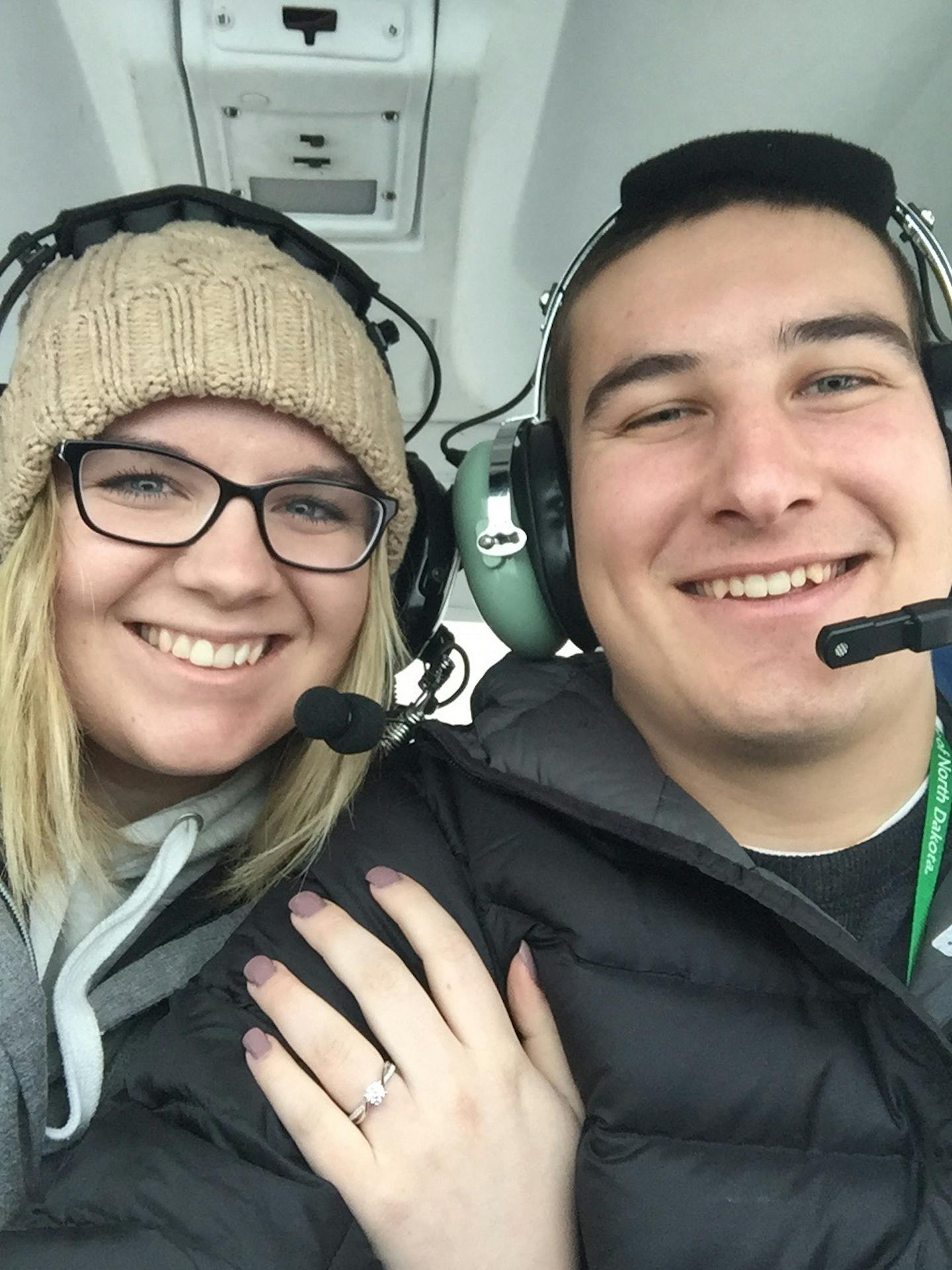 Gavin Becker and Olivia Toft celebrate getting engaged.