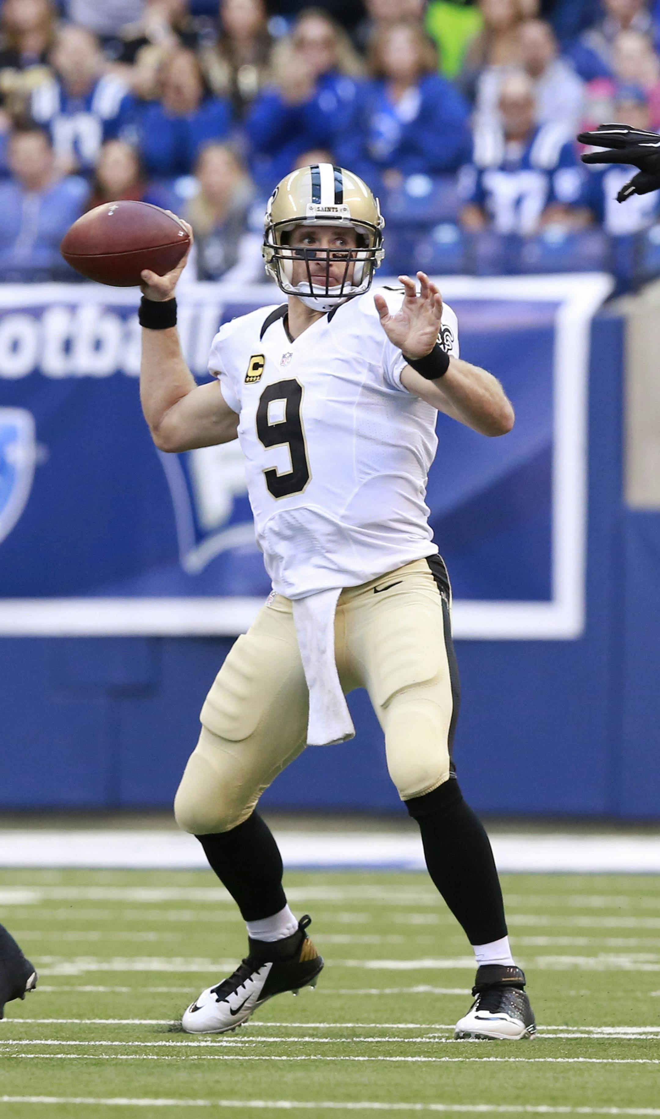 Indianapolis Colts outside linebacker Robert Mathis (98) is blocked by New Orleans Saints tight end Michael Hoomanawanui (84) to allow quarterback Drew Brees (9) to throw in the second half of an NFL football game in Indianapolis, Sunday, Oct. 25, 2015. The Saints defeated the Colts 27-21. (AP Photo/R Brent Smith) ORG XMIT: MIN2015111417204650