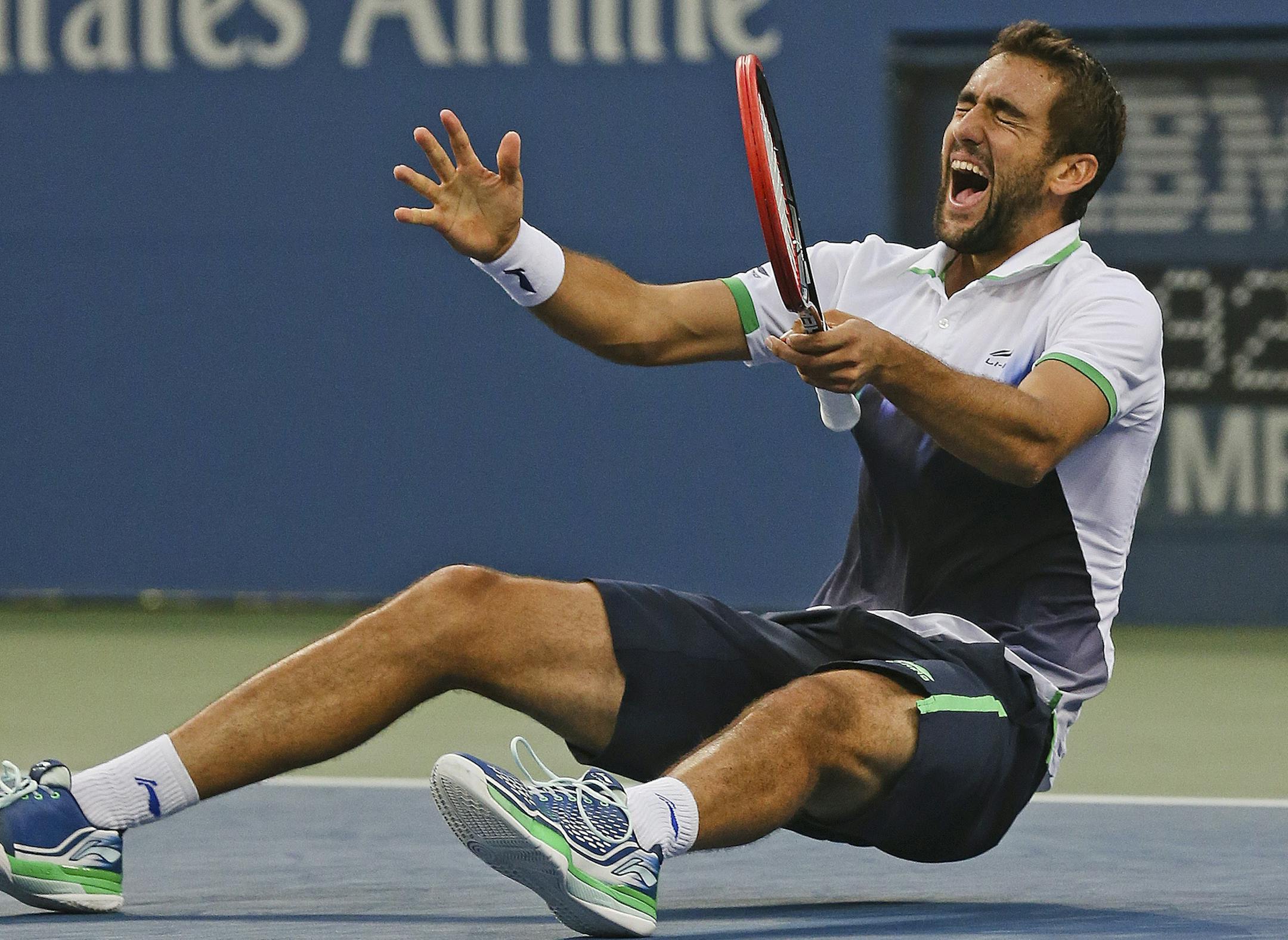 Marin Cilic, of Croatia, reacts after defeating Kei Nishikori, of Japan, during the championship match of the 2014 U.S. Open tennis tournament, Monday, Sept. 8, 2014, in New York. (AP Photo/Mike Groll)