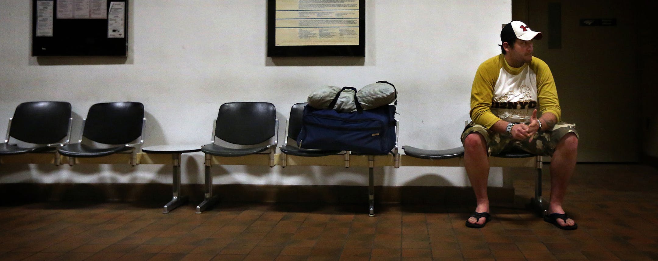 Andrew waited patiently for his train to leave the St. Paul Amtrak station for Williston. ] (JIM GEHRZ/STAR TRIBUNE) / September 26, 2013, Williston, ND ‚Äì BACKGROUND INFORMATION- PHOTOS FOR USE IN FIRST PART OF NORTH DAKOTA OIL BOOM PROJECT: Andrew Klefstad, 28, is the general manager of an environmental company that cleans up frac gel-spills and scrubs sludge off trucks that serve the needs of the oil boom in the Bakken oil fields of North Dakota. Klefstad, works in the oil f