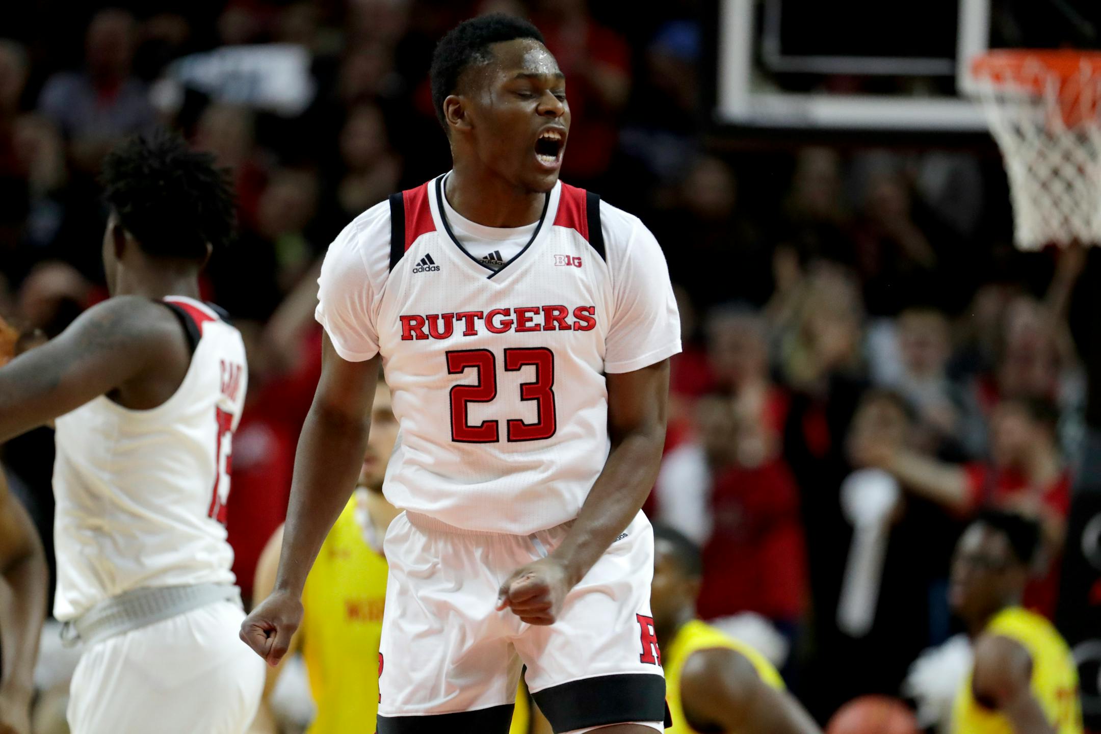 Rutgers guard Montez Mathis reacts after shooting a basket against Maryland during the first half of an NCAA college basketball game, Saturday, Jan. 5, 2019, in Piscataway, N.J. (AP Photo/Julio Cortez)