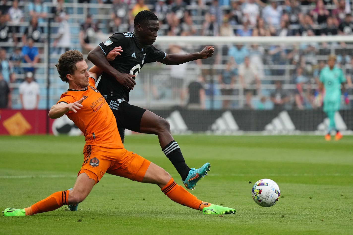 Houston Dynamo defender Adam Lundqvist (3) cleared the ball away from Minnesota United forward Bongokuhle Hlongwane (21) in the first half of an MLS game between Minnesota United and the Houston Dynamo Saturday, Aug. 27, 2022 at Allianz Field in St. Paul, Minn. ] ANTHONY SOUFFLE • anthony.souffle@startribune.com